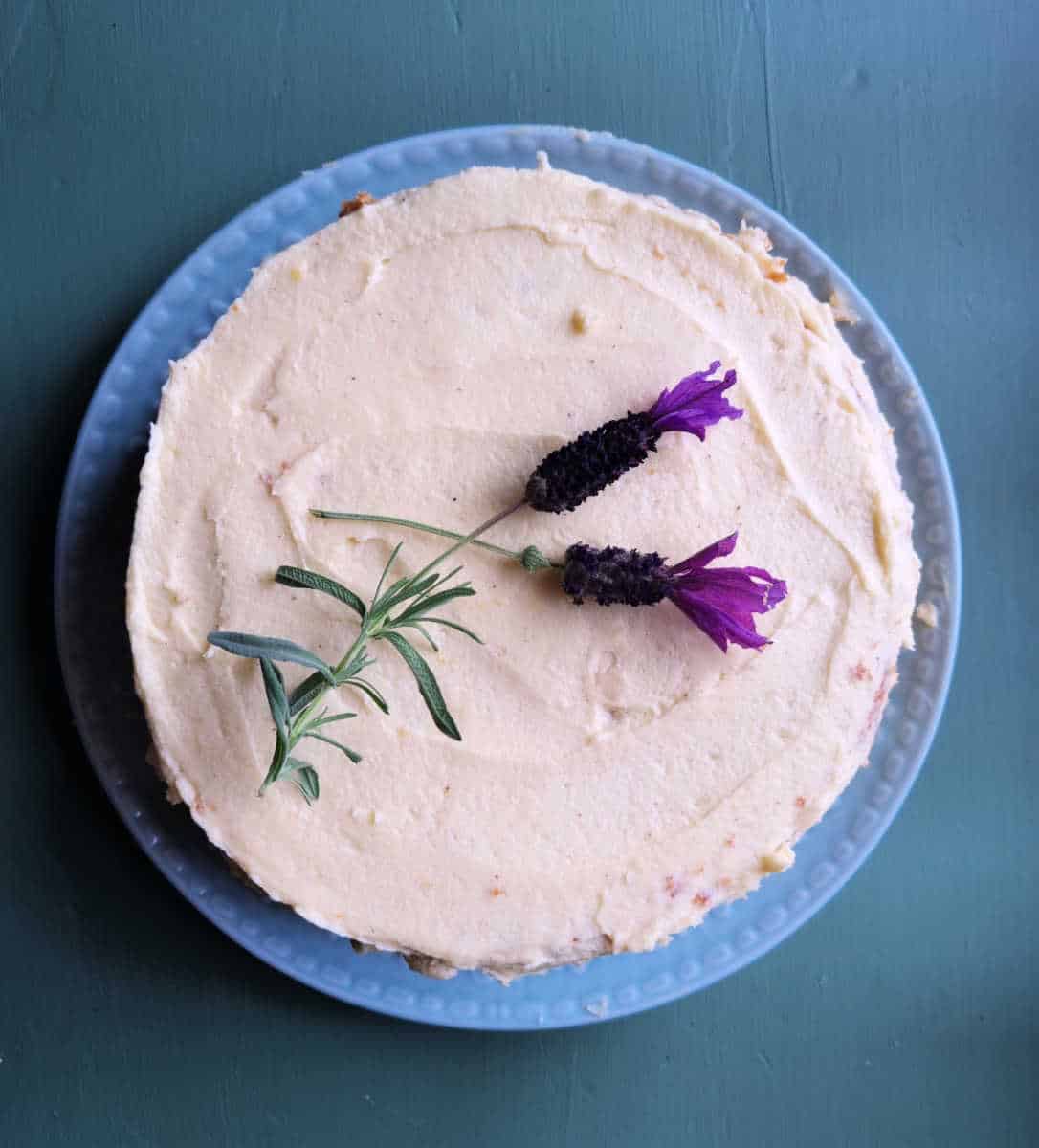 iced-cake-with-the-best-icing-white-two-lavender-sprigs-on-top